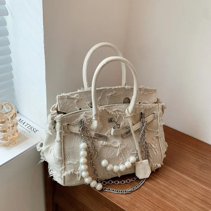 Kelly Bag 2024, Vintage Denim Crossbody Bag with Tassel & Lock Closure - 1