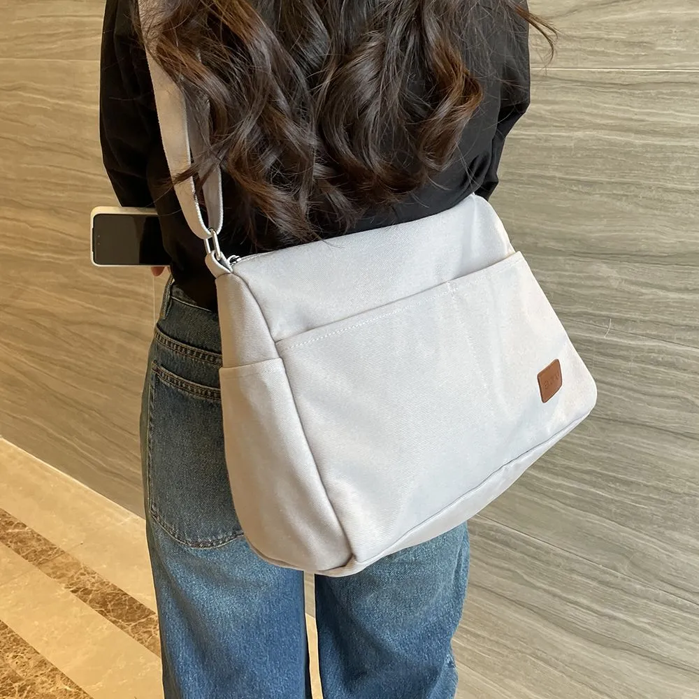 Canvas Messenger Bag Large Capacity Unisex Crossbody Bag for Commute & College - 1