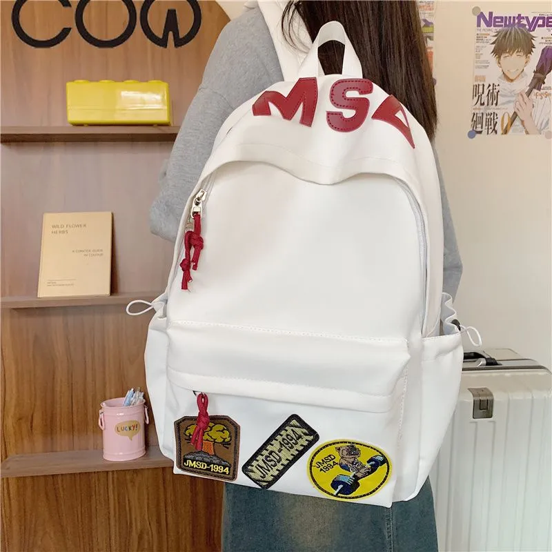 COW Minimalist Backpack for College Students, Large Capacity Daypack with Letters - 1